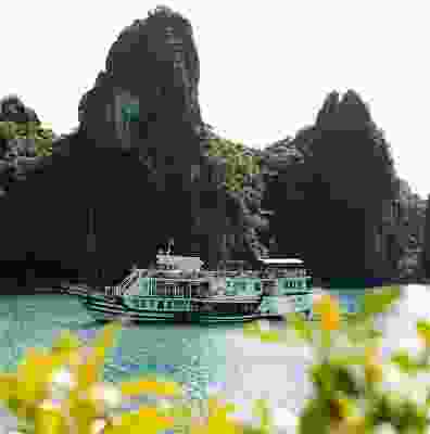 Boat cruise passing by Ha Long Bay. 