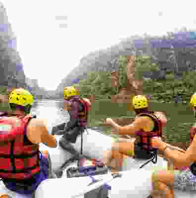 Group of travelling white water rafting in Victoria Falls